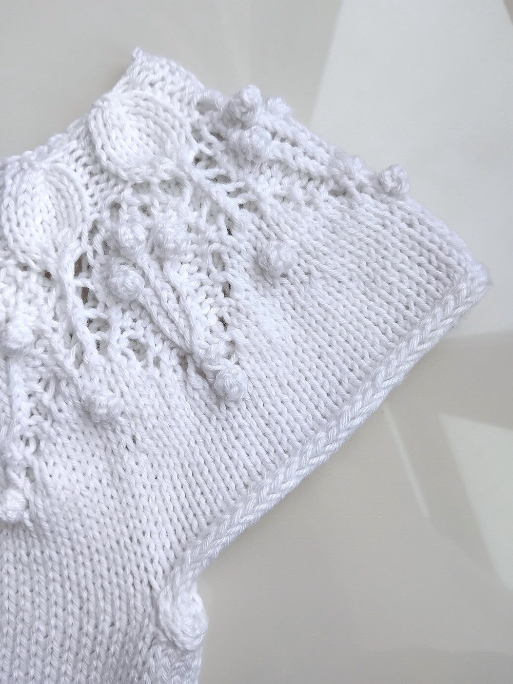 Lasten Aavikkoruusu-kaarrokeneule, neuleohje