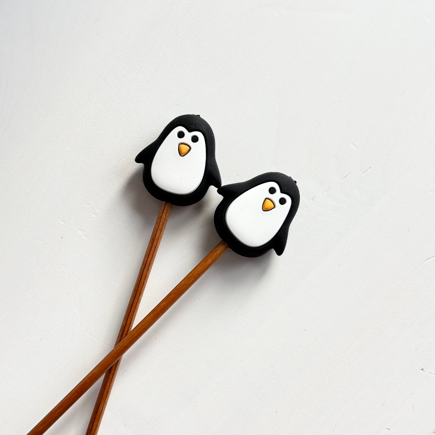 Puikkostopparit, pingviini, musta