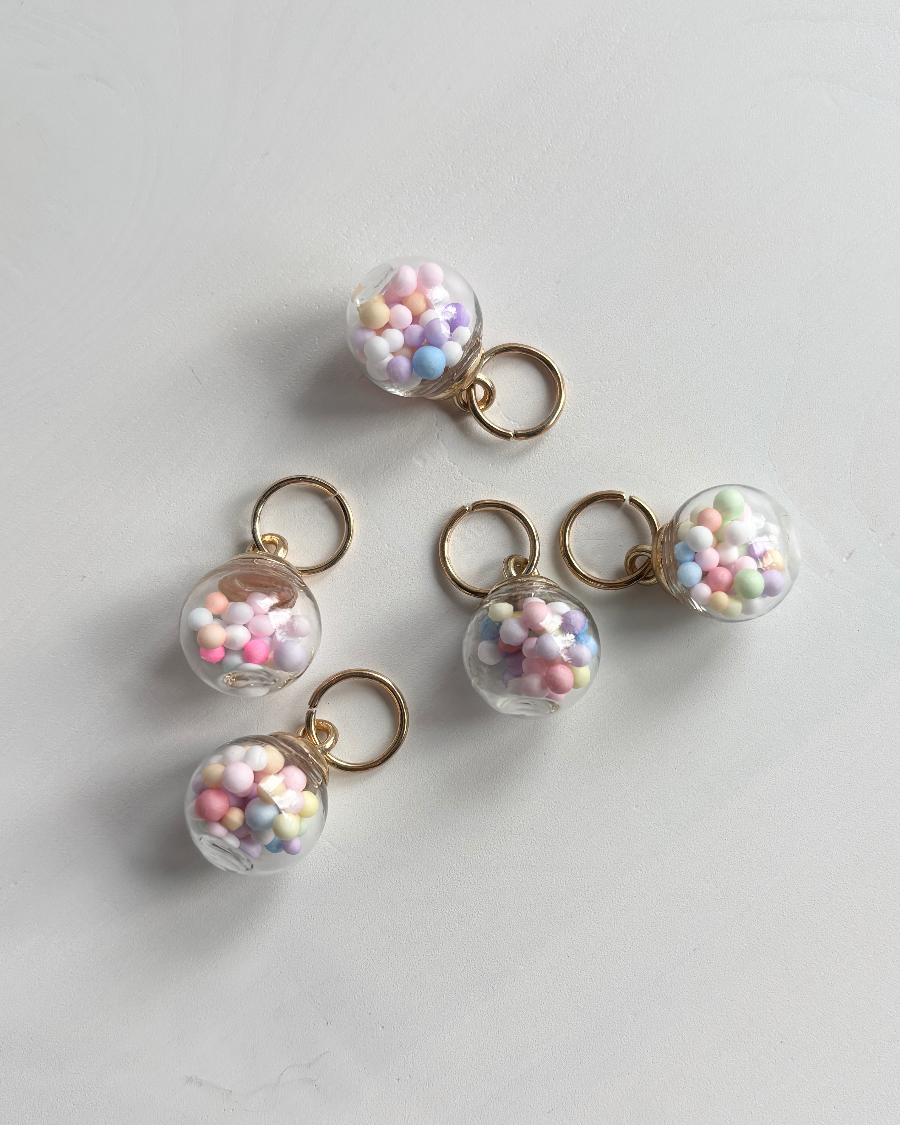 Silmukkamerkki, Pastellipallo